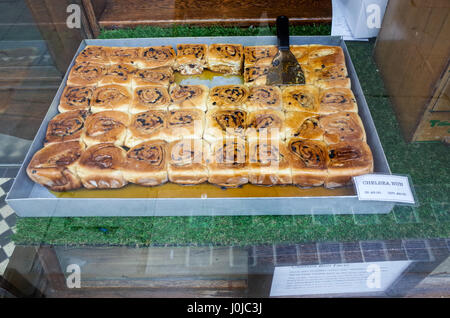 Chelsea or Sticky Buns in the window of Fitzbillies tea shop and restaurant in Cambridge UK Stock Photo