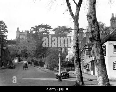 With a view of the Episcopal residence of the Bishop of Guildford, rising alongside the ancient Castle Keep, on the hill which overlooks the town, Castle Street, Farnham, Surrey. Stock Photo