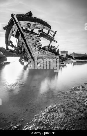 Remains of a ship, on Cadiz Coast, Spain. Black and White. Stock Photo