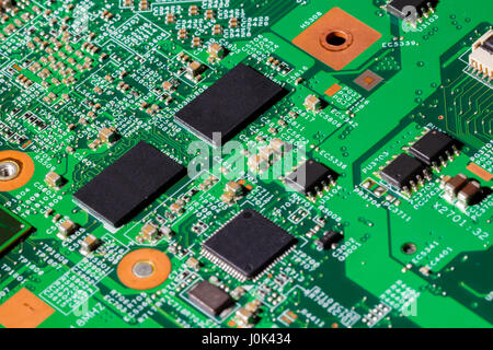 Close up shot of computer chips on a PCB Stock Photo