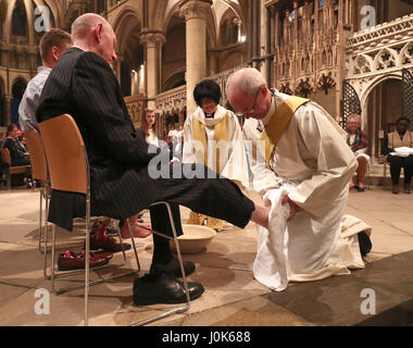 The Archbishop of Canterbury Justin Welby performs the Washing of The Feet ceremony during the Maundy Thursday service at Canterbury Cathedral in Kent. Stock Photo