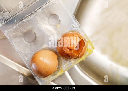 broken eggs pack box Stock Photo