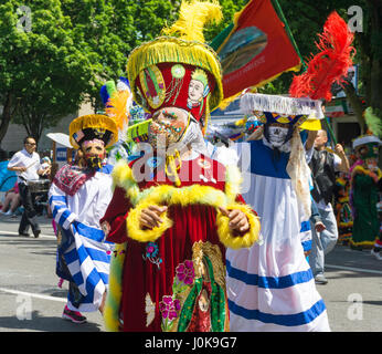 PORTLAND, OR - JUNE 6: People dressed in traditional costumes from Mexico as part of the Grand Floral Parade in Portland, Oregon on June 6, 2015 Stock Photo