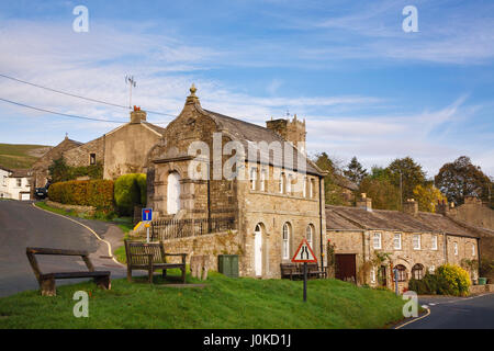 Muker Literary Institute and limestone cottages in village in Yorkshire Dales National Park. Muker, Swaledale, North Yorkshire, England, UK, Britain Stock Photo