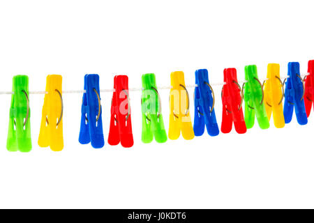 Colored red, yellow, green, blue clothespins hanging on a rope isolated on white background Stock Photo