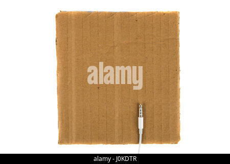 White minijack connection on cardboard background. view from above Stock Photo