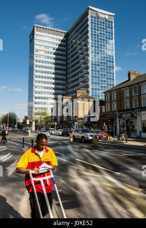 A DHL delivery next to Chiswick Tower - one of West London's major landmark high-rise office buildings, Chiswick, London, England, U.K. Stock Photo