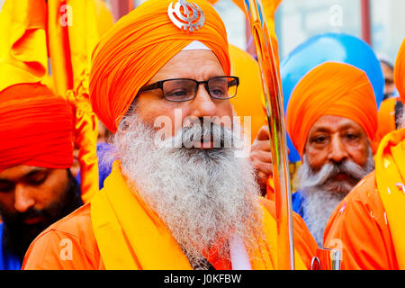 Sikh procesion of religious leaders, Panj Pyare, the beloved ones at the annual harvest festival of Vaishakhi, outside the Gurdwara, Otago Street, Gla Stock Photo