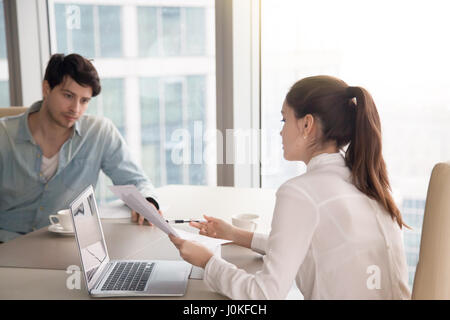 Business meeting, man and woman working on project at office Stock Photo