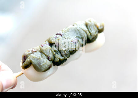 Dango - Japanese rice dumpling made of green tea and red bean Stock Photo