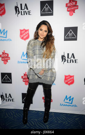 Singer Becky G attends The Salvation Army #|#Rock The Red Kettle#|# Concert at Microsoft Theater on December 5th, 2015 in Los Angeles, California. Stock Photo