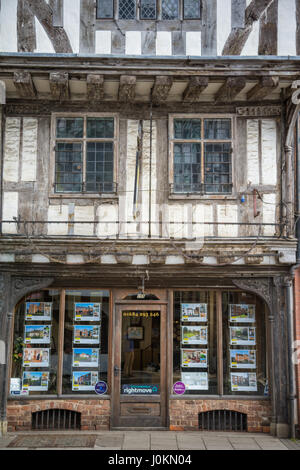 Traditional tudor oak beamed timber building in Tewkesbury now used as an estate agents Britain UK Stock Photo