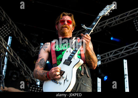 MADRID - SEP 10: Eagles of Death Metal (American rock band  founded by Jesse Hughes and Josh Homme) perform in concert at Dcode Music Festival on Sept Stock Photo