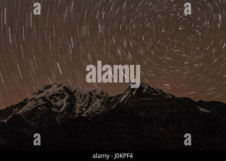 The stars above Annapurna South during one night of a trek through the Himalayas Stock Photo