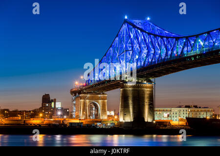 Montreal, CA - 13 April 2017: The Jacques-Cartier Bridge tests its new lighting system created by Moment Factory before official launch on May 17, 201 Stock Photo