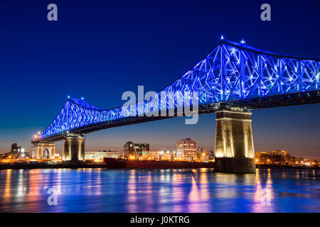 Montreal, CA - 13 April 2017: The Jacques-Cartier Bridge tests its new lighting system created by Moment Factory before official launch on May 17, 201 Stock Photo