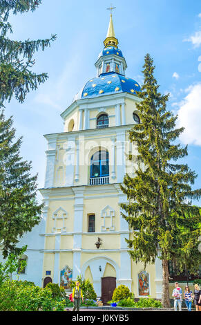 KIEV, UKRAINE - MAY 2, 2016: Bell Tower with golden stars on the dome of Vydubychi Monastery is most beautiful building in complex, on May 2, in Kiev Stock Photo