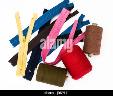 Accessories for repair and tailoring, zippers, threads, buttons. Studio Photo Stock Photo