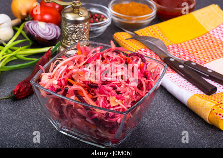 Fresh vegetables, cut into strips, in glass bowl. Studio Photo Stock Photo