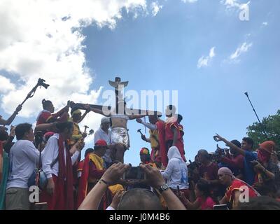 Philippines. 14th Apr, 2017. Two men and a woman was crucified in the ...