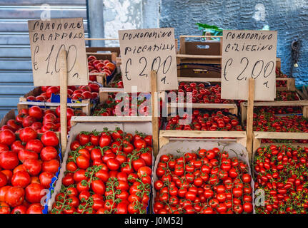 Variety of tomatoes for sale on daily outdoor market in Syracuse city, southeast corner of the island of Sicily, Italy Stock Photo
