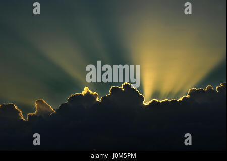 Dramatic sunset with rays of sunlight Stock Photo
