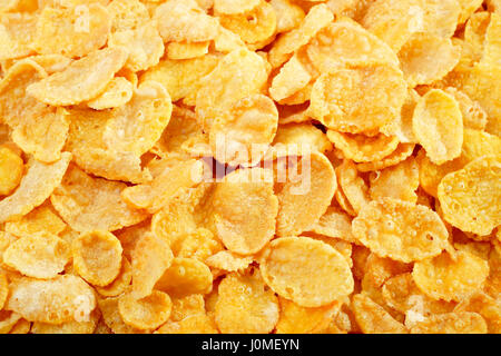 Yellow cornflakes texture close up photo Stock Photo
