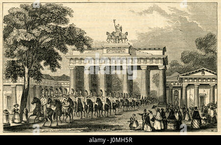 Antique 1854 engraving, 'Brandenburg Gate at Berlin, Prussia.' The Brandenburg Gate (German: Brandenburger Tor) is an 18th-century neoclassical monument in Berlin, and one of the best-known landmarks of Germany. It is built on the site of a former city gate that marked the start of the road from Berlin to the town of Brandenburg an der Havel. SOURCE: ORIGINAL ENGRAVING. Stock Photo