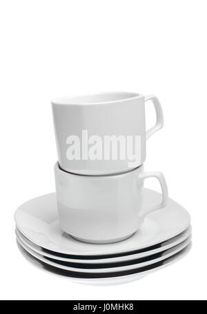 Close up of stack of white ceramic dishes on white background Stock Photo