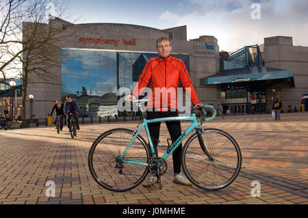 Paul Hudson on his bike in Birmingham in front of the Town Hall and riding along the canals. Stock Photo