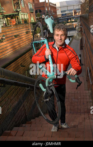 Paul Hudson on his bike in Birmingham in front of the Town Hall and riding along the canals. Stock Photo