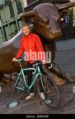 Paul Hudson on his bike in Birmingham in front of the Town Hall and riding along the canals. Stock Photo