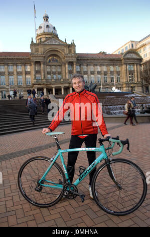 Paul Hudson on his bike in Birmingham in front of the Town Hall and riding along the canals. Stock Photo