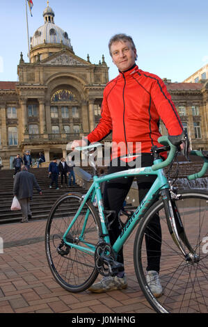 Paul Hudson on his bike in Birmingham in front of the Town Hall and riding along the canals. Stock Photo