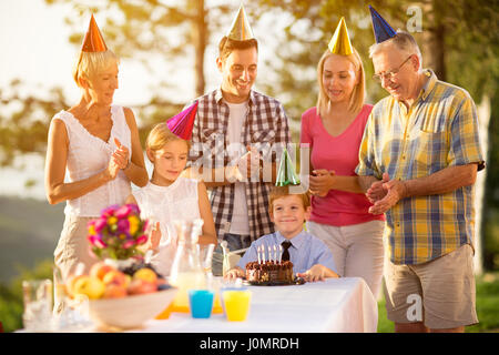 Happy Family birthday party in garden Stock Photo