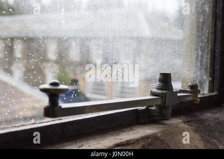 Old glass window with air bubbles at Armathwaite Hall, Bassenthwaite Stock Photo
