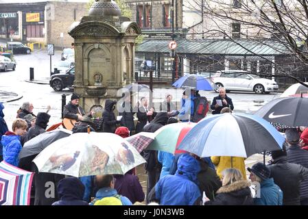 Buxton, Derbyshire 14th April 2017 Christians in Buxton celebrate Good Friday with a Walk of Witness from the Parish Church of St John to the pedestrianised shopping centre. They stop four times for hymns and reading from St Mark's Gospel. Christians throughout the world celebrate Good Friday as the day when Jesus Christ was crucified, before rising again on Easter Sunday. Credit: John Fryer/Alamy Live News Stock Photo