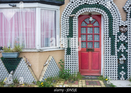 Hartlepool, County Durham, UK. 14th Apr, 2017. Weather: A cool and breezy Good Friday in Hartlepool, County Durham, as west north/westerly winds feed cold air over much of the UK. PICTURED: Not the weather for cracking open a tin or two around the BBQ over the holiday weekend. This house in Hartlepool is clad with 75,000 empty beer cans! Phil Muspratt - who passed away in Oct 2015 - started cladding his house with empty beer cans and bottles in 2005. Credit: ALAN DAWSON/Alamy Live News Stock Photo