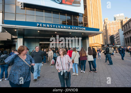 New York, USA. 14th Apr, 2017. Travelers mill about outside of Penn Station in New York on Friday, April 14, 2017 after an unfounded active shooter report.  (© Richard B. Levine) Credit: Richard Levine/Alamy Live News Stock Photo
