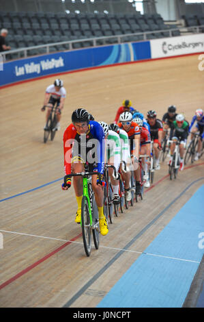 London, UK. 14th April, 2017. Cyclists racing around Lee Valley Velodrome during the Southern Counties Cycling Union Good Friday Track Cycling Meet, London, UK. The Good Friday Meeting is an iconic and unique track cycling event held in the UK that has a 114 year history. As the only open entry event in British track cycling, it sees amateur and professional riders competing alongside each other on the same track. Credit: Michael Preston/17�Թ����� Live News Stock Photo