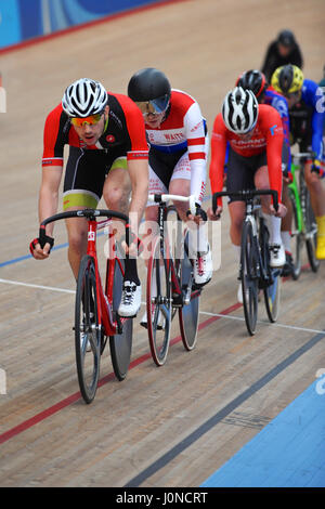 London, UK. 14th April, 2017. Cyclists racing around Lee Valley Velodrome during the Southern Counties Cycling Union Good Friday Track Cycling Meet, London, UK. The Good Friday Meeting is an iconic and unique track cycling event held in the UK that has a 114 year history. As the only open entry event in British track cycling, it sees amateur and professional riders competing alongside each other on the same track. Credit: Michael Preston/17�Թ����� Live News Stock Photo