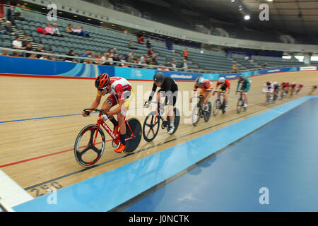 London, UK. 14th April, 2017. George Clark (Catford CC Equipe/Banks) pushing hard during racing at the Southern Counties Cycling Union Good Friday Track Cycling Meet, London, UK. The Good Friday Meeting is an iconic and unique track cycling event held in the UK that has a 114 year history. As the only open entry event in British track cycling, it sees amateur and professional riders competing alongside each other on the same track. Credit: Michael Preston/17�Թ����� Live News Stock Photo