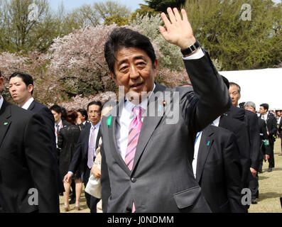 Tokyo, Japan. 15th Apr, 2017. Japanese Prime Minister Shinzo Abe reacts to invited guests during the cherry blossom viewing party at the Shinjuku Gyoen park in Tokyo on Saturday, April 15, 2017. More than ten thousands of invited guests enjoyed the annual garden party hosted by Abe. Credit: Yoshio Tsunoda/AFLO/Alamy Live News Stock Photo