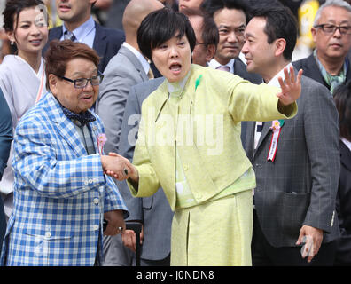 Tokyo, Japan. 15th Apr, 2017. Akie Abe (R), wife of Japanese Prime Minister Shinzo Abe shakes hands with a comedian Boo Takagi during the cherry blossom viewing party at the Shinjuku Gyoen park in Tokyo on Saturday, April 15, 2017. More than ten thousands of invited guests enjoyed the annual garden party hosted by Abe. Credit: Yoshio Tsunoda/AFLO/Alamy Live News Stock Photo