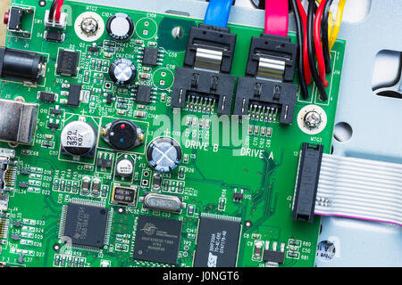 Circuit board of computer hard drive, cables, connections and terminals Stock Photo