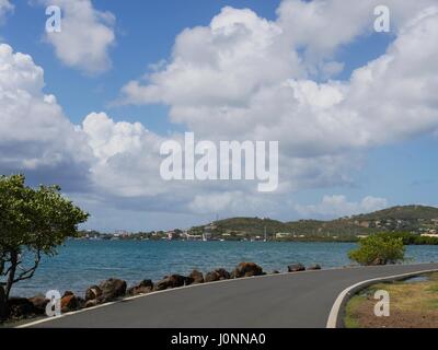 Coastal Road, Culebra, Puerto Rico A scenic coastal road in Culebra offers motorists spectacular view of the beach. Stock Photo