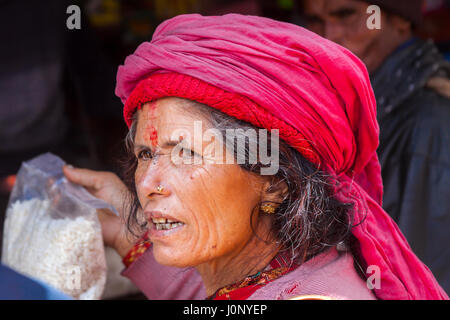 BADRINATH - INDIA, JUNE 5th - An old female pilgrim at the temple of Badarinath in North India on June 5th 2013 Stock Photo