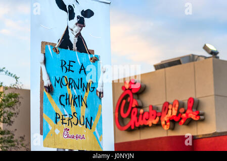 Peach sculpture and round, rotating Chick-fil-A billboard along Peachtree  Street and I-85 in Midtown Atlanta, Georgia, near Buckhead. (USA Stock  Photo - Alamy