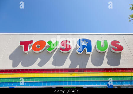 Naples, Fl, USA - March 19, 2017: Toys R Us corporate logo on a branch store in the city of Naples. Florida, United States Stock Photo
