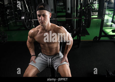 Premium Photo  Tired breathing and fitness gym man taking a break